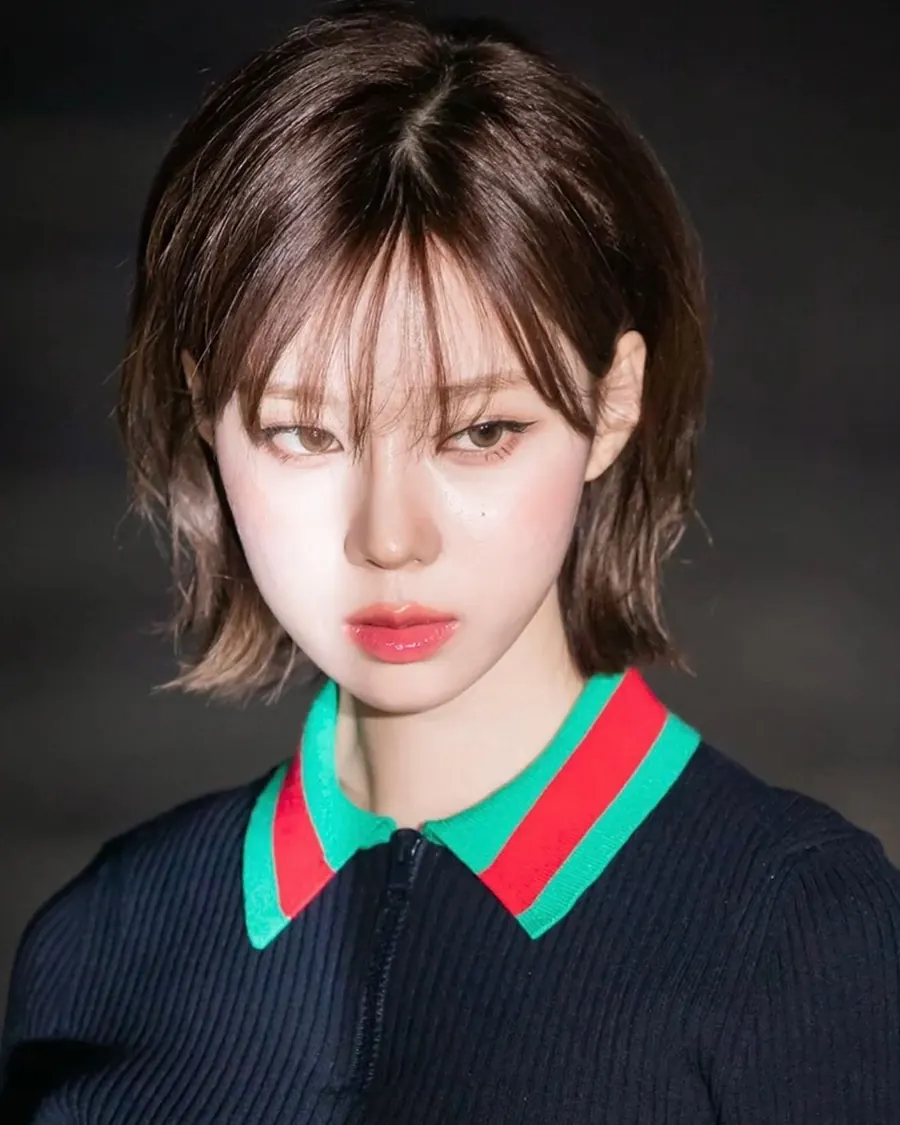 aespa's Winter with glossy lips and sharp corner liner, makeup by Kitts