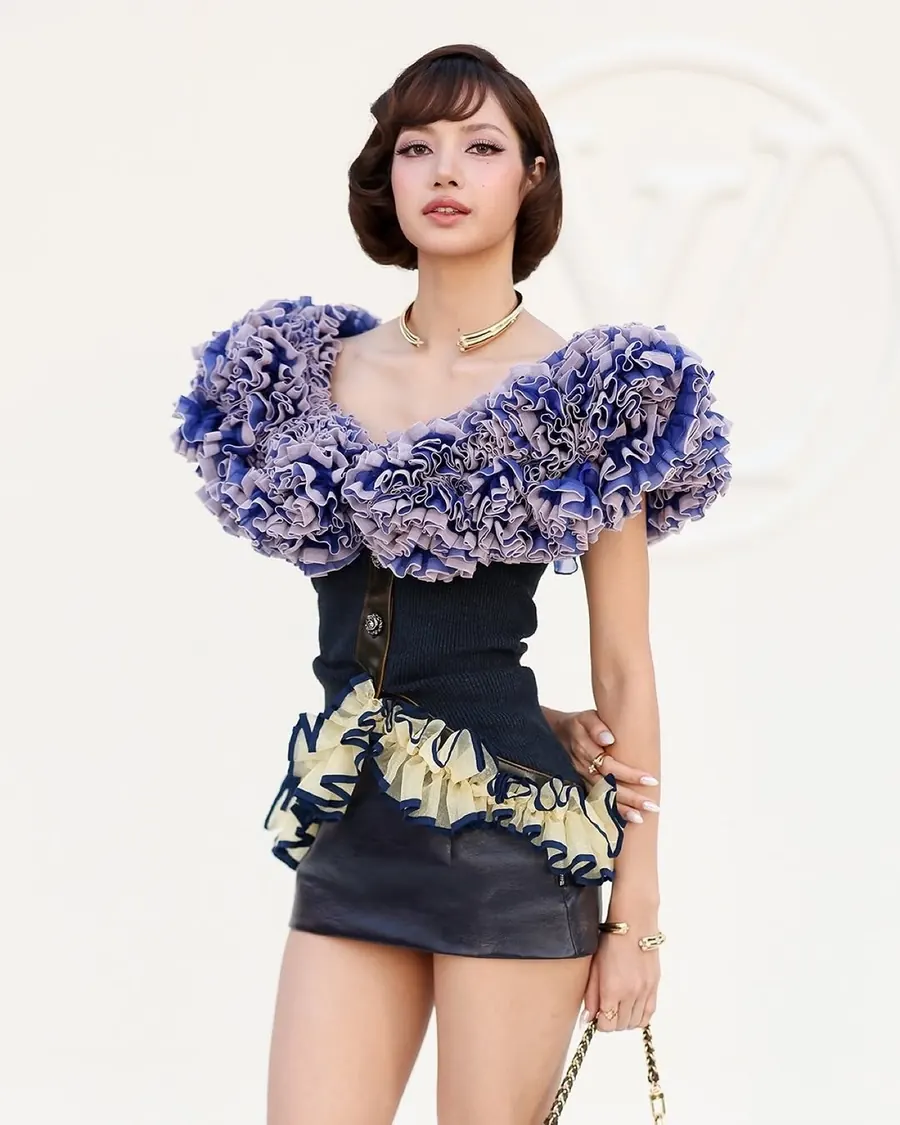 Lisa in a Louis Vuitton look, makeup by Woosun